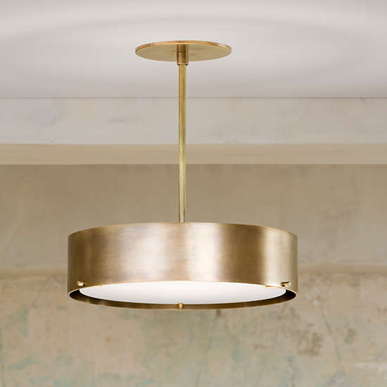 The Alberto Pendant is a cylindrical shade made from solid hand-rubbed brass and glass. Its minimal, elegant design provide for a solid yet quiet presence in any space.