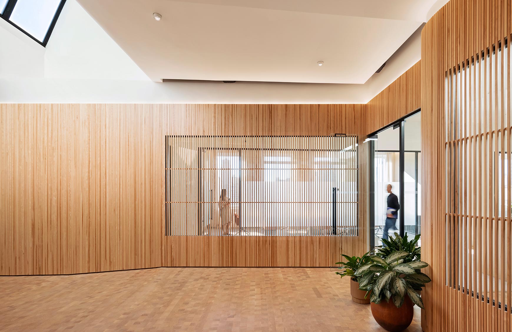Shared Office, NYC - The renovation of a 17,000-SF penthouse office provides a new workplace for several distinct firms sharing common amenities.